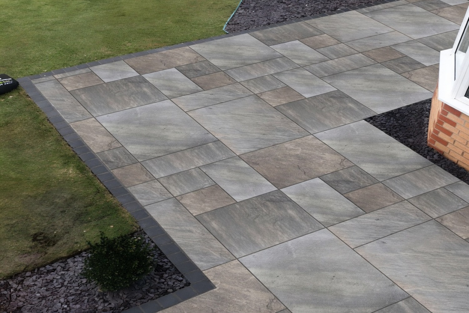 Grey-slab patio in a planted garden
